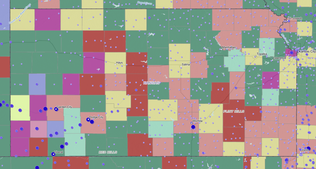 A map of Kansas showing employment and lack of health insurance.