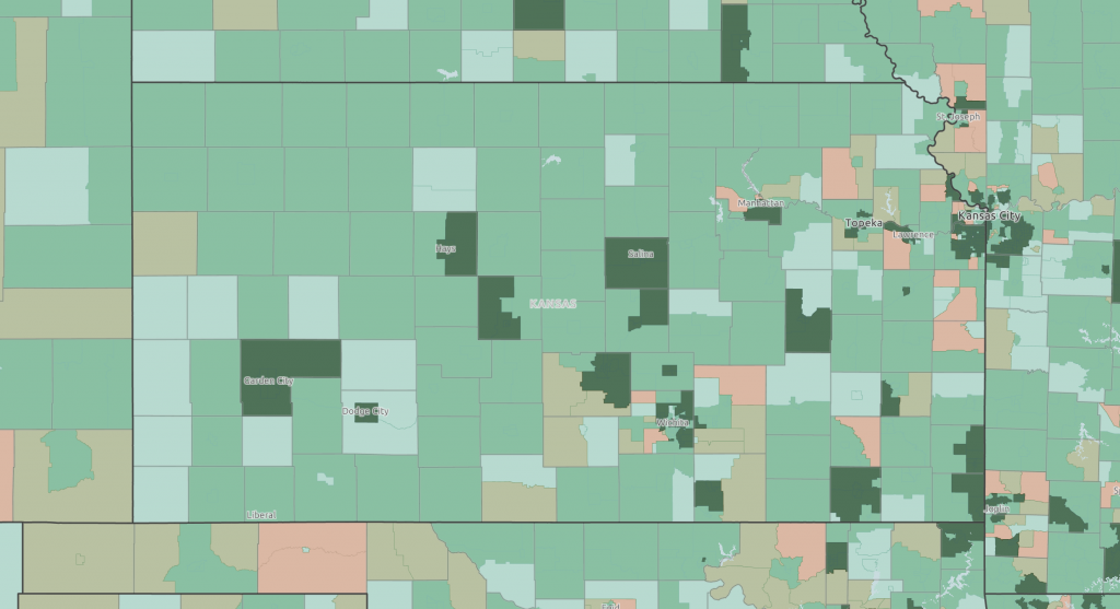 A green and peach map of Kansas showing rates of banks and banking deserts.